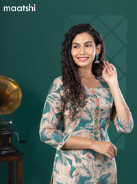 Tissue readymade kurti beige and teal green with allover floral prints & beaded mirror work neck pattern without bottom