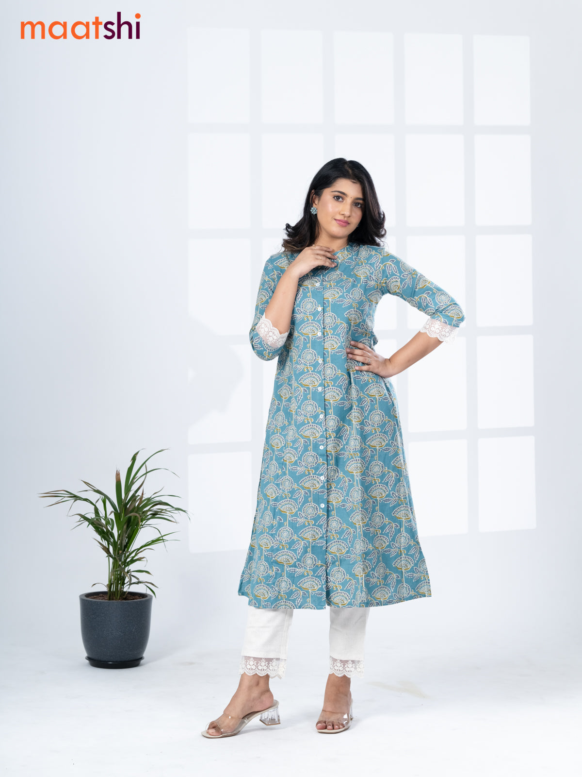 Cotton readymade kurti set teal blue shade and off white with allover floral prints & simple neck pattern and straight cut pant