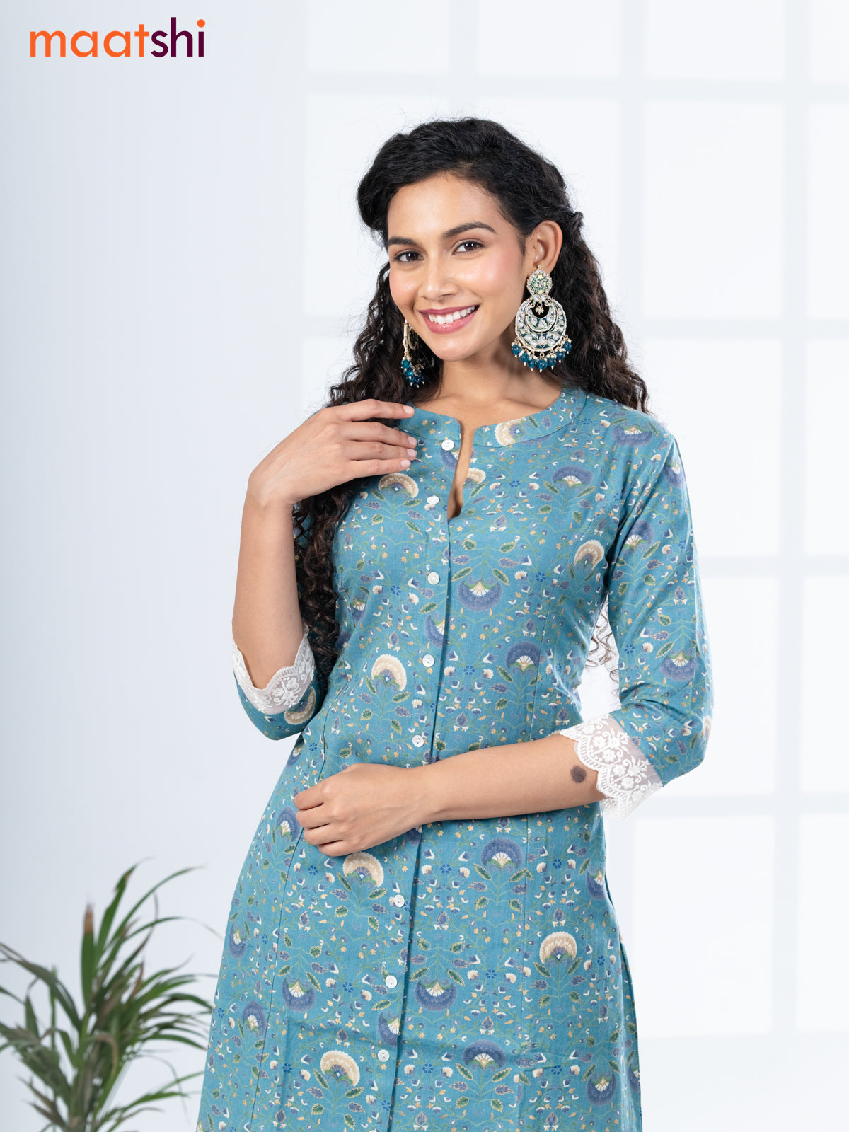 Cotton readymade kurti set teal blue and off white with allover floral prints & simple neck pattern and straight cut pant