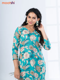 Cotton readymade kurti set teal green with allover floral prints & v neck pattern and straight cut pant