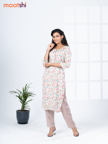 Rayon readymade kurti set off white and multi colour with allover floral prints & simple neck pattern and straight cut pant