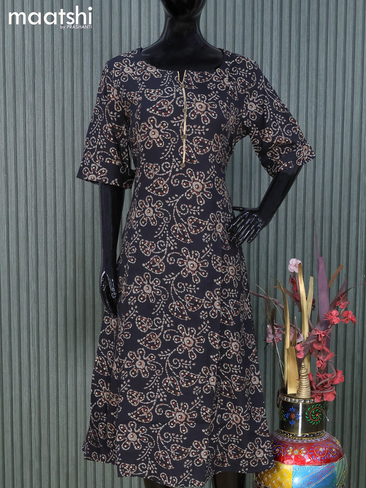 Rayon readymade A -line kurti black with allover batik prints and without pant