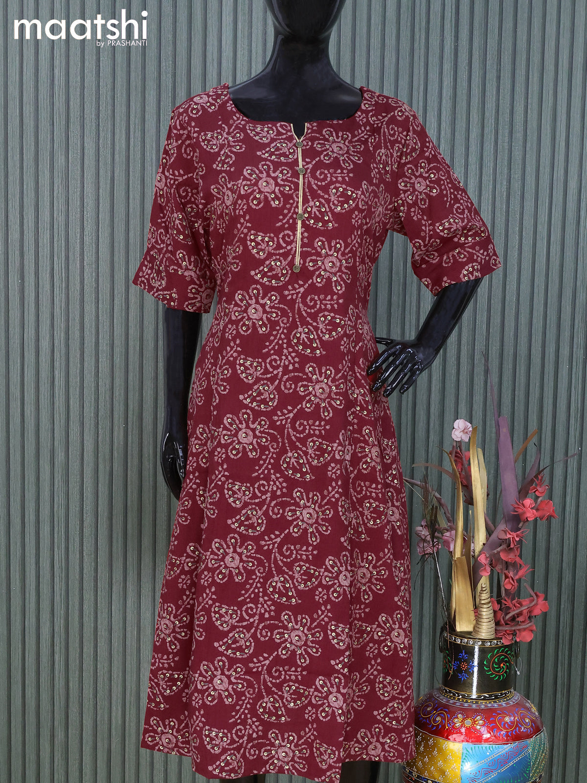 Rayon readymade A -line kurti maroon with allover batik prints and without pant