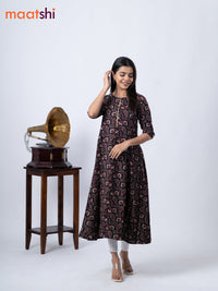 Rayon A -line kurti black with allover prints and without pant