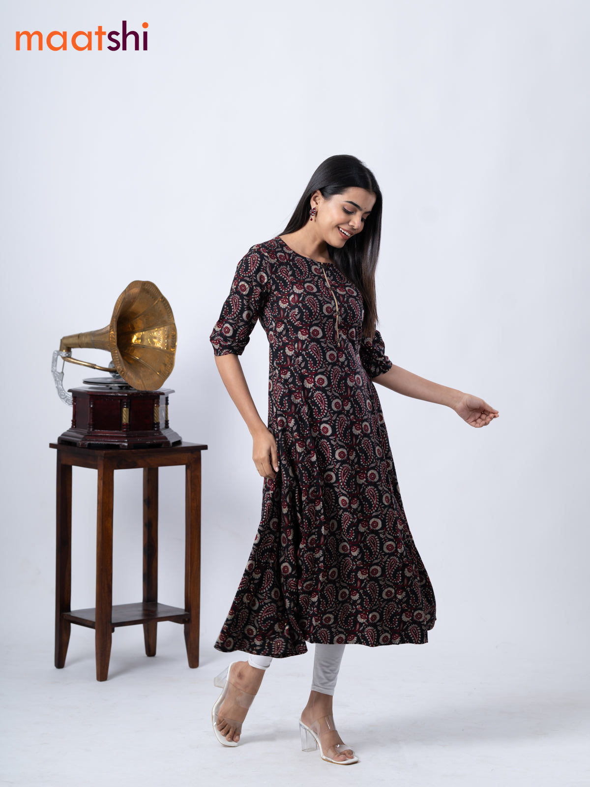 Rayon A -line kurti black with allover prints and without pant