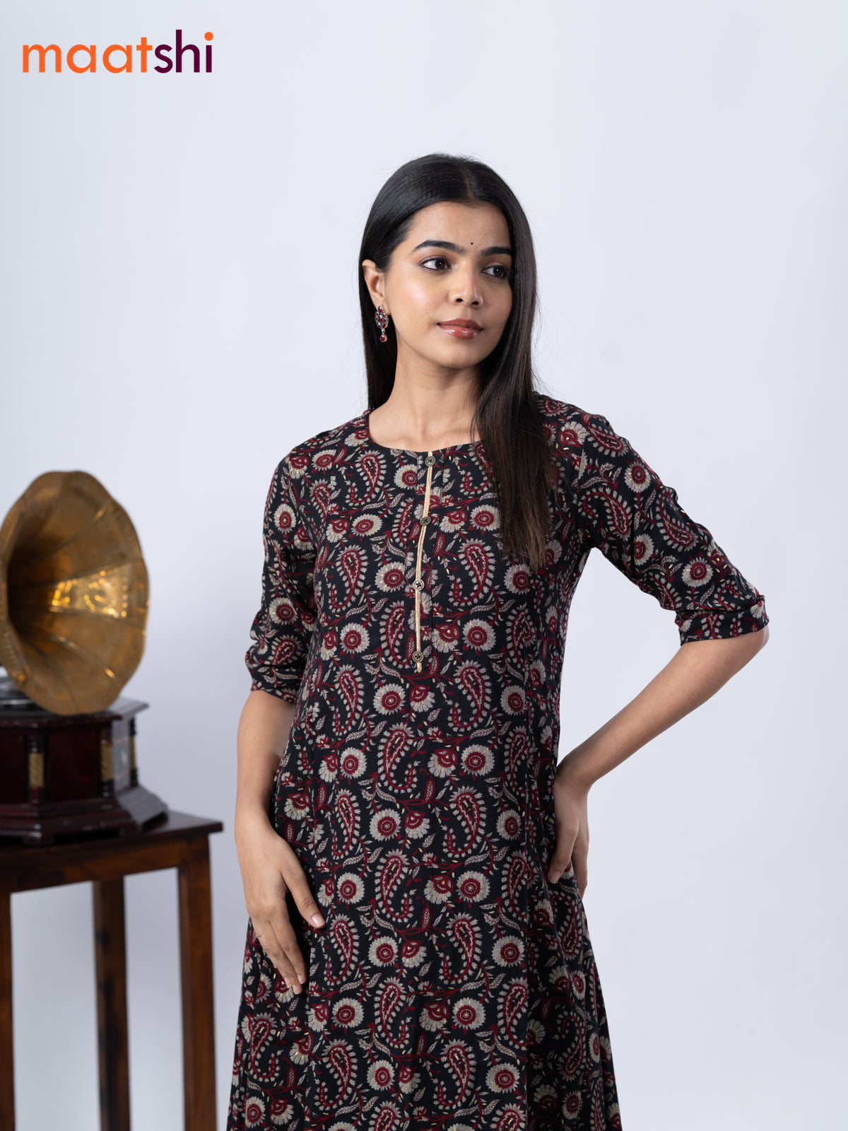 Rayon A -line kurti black with allover prints and without pant