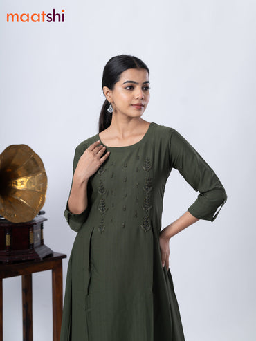 Rayon A-line kurti sap green and with beaded embroidery work neck pattern and without pant