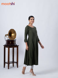 Rayon A-line kurti sap green and with beaded embroidery work neck pattern and without pant