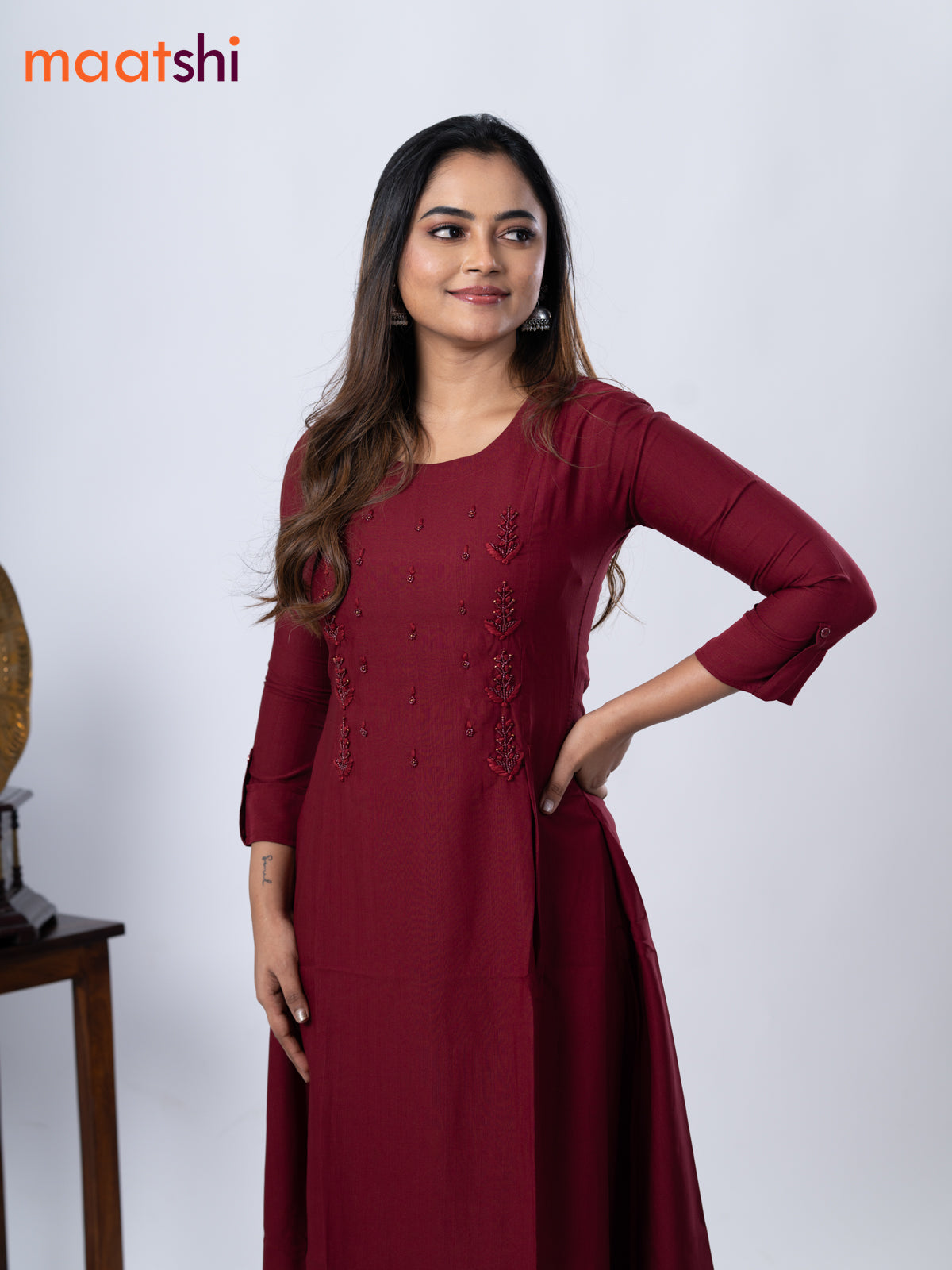 Rayon A-line kurti maroon and with beaded embroidery work neck pattern and without pant