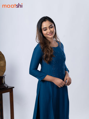 Rayon A-line kurti peacock blue and with beaded embroidery work neck pattern and without pant