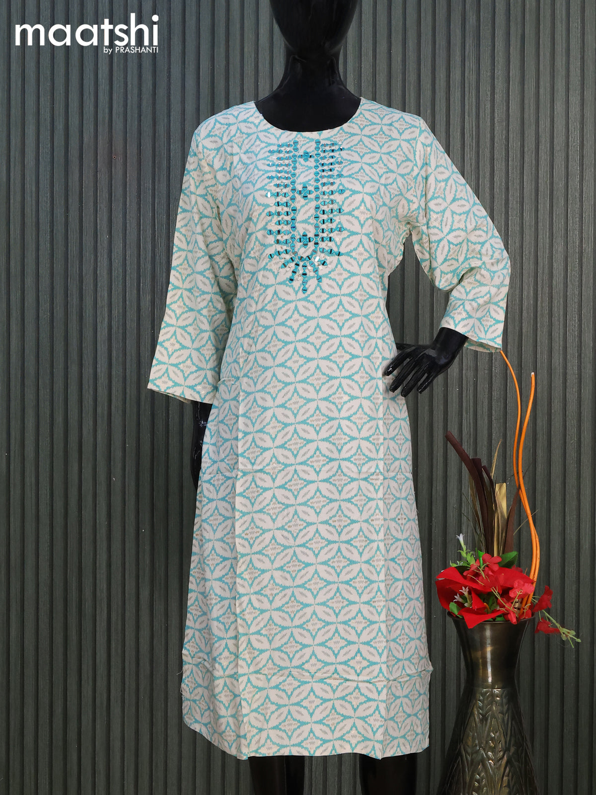 Cotton readymade kurti off white and teal green with allover geometric prints & simple work neck pattern without pant