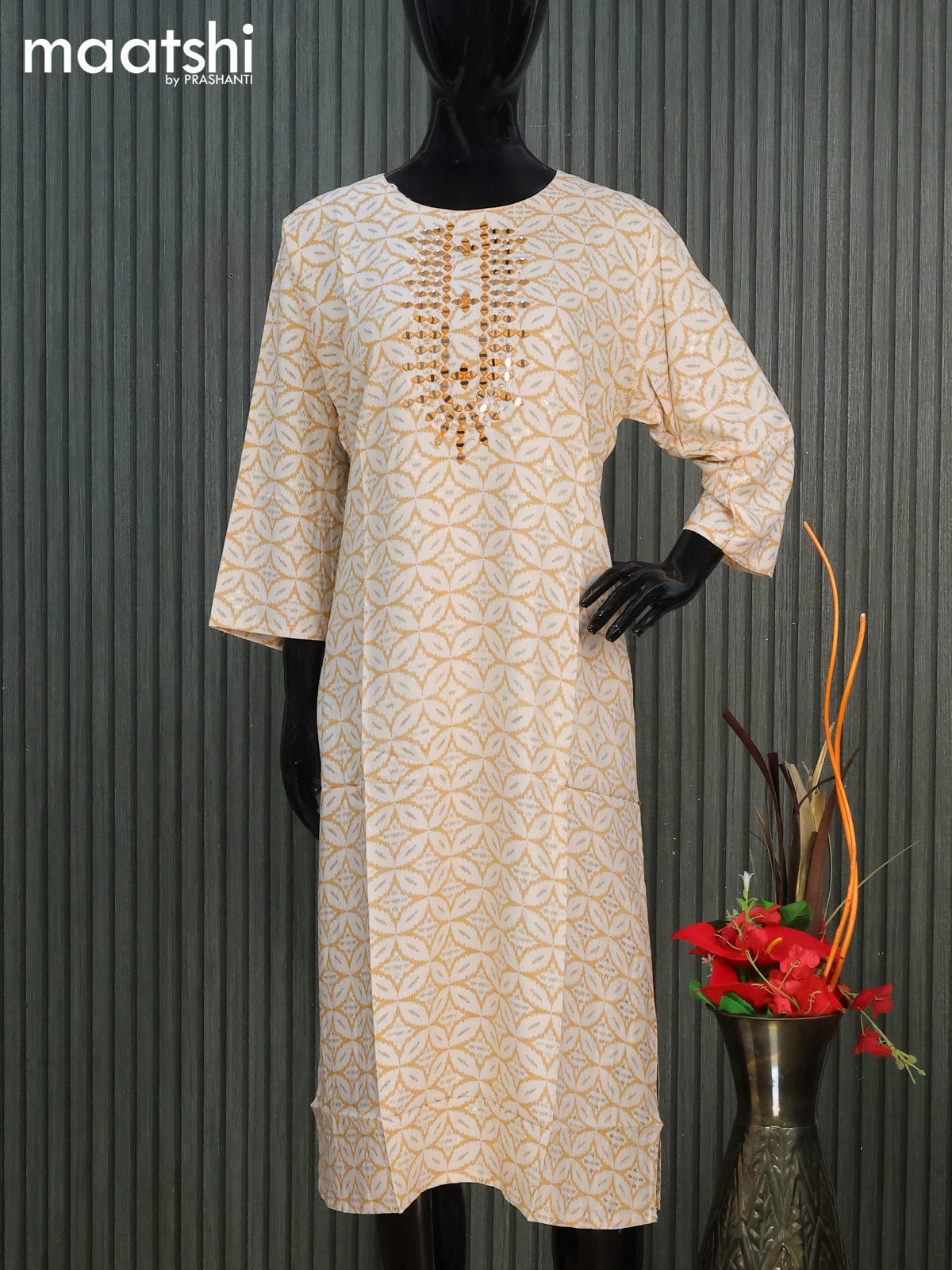 Cotton readymade kurti off white and mustard yellow with allover geometric prints & simple work neck pattern without pant