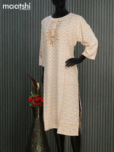 Cotton readymade kurti off white and mustard yellow with allover geometric prints & simple work neck pattern without pant