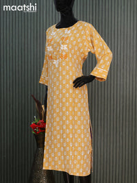 Cotton readymade kurti mustard yellow with allover butta prints & embroidery work neck pattern without pant