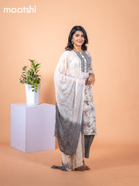 Rayon salwar suit cream and dark grey with allover prints & gotapatti lace work neck pattern and straight cut pant & chiffon embroidery work dupatta