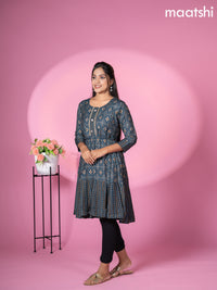 Muslin readymade short umbrella kurti peacock blue with allover patola & lace work neck pattern without pant