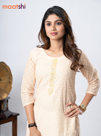 Cotton kurti off white and yellow with geometric print chikankari work & beaded neck pattern without pant