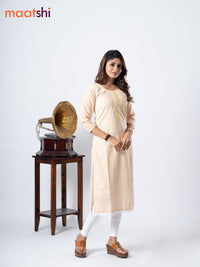 Cotton kurti off white and yellow with geometric print chikankari work & beaded neck pattern without pant