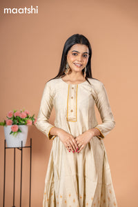 Rayon readymade anarkali kurti cream with golden butta prints & simple neck pattern without pant