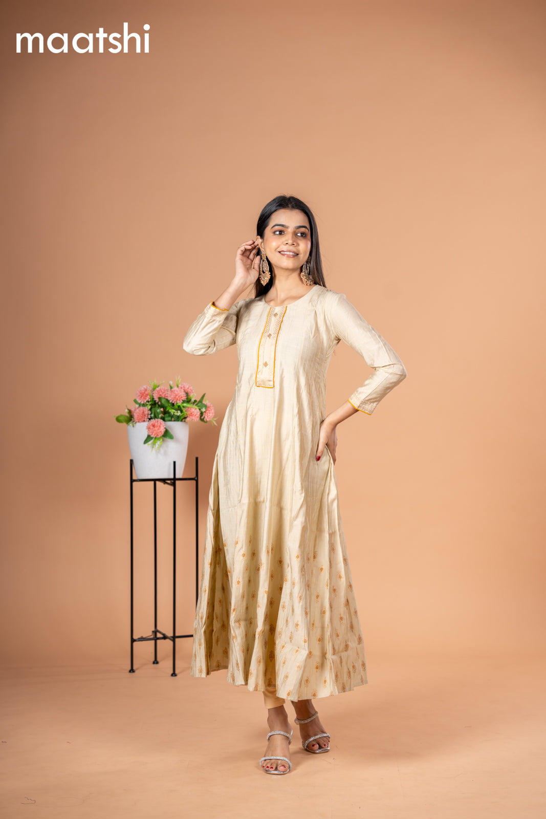 Rayon readymade anarkali kurti cream with golden butta prints & simple neck pattern without pant