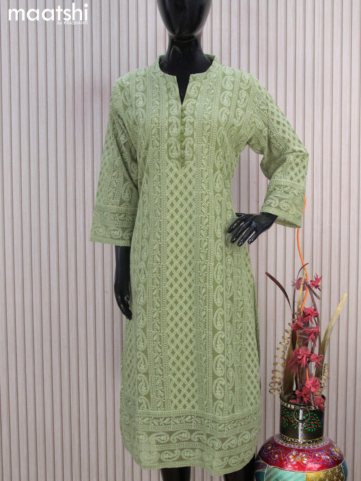 Semi georgette readymade kurti pastel green with allover chikankari work & simple neck pattern without pant