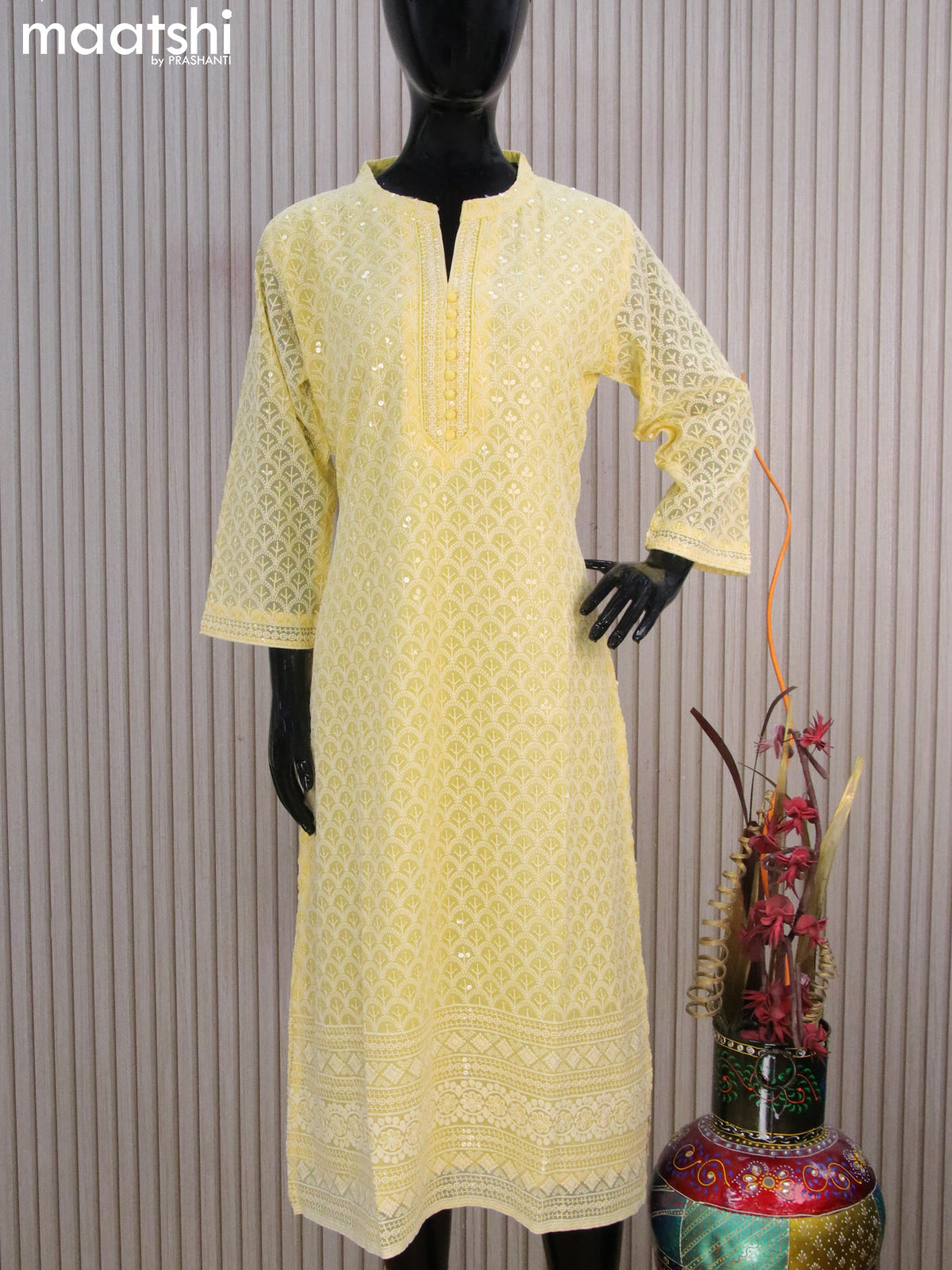 Semi georgette readymade kurti pale yellow with allover chikankari work & simple neck pattern without pant