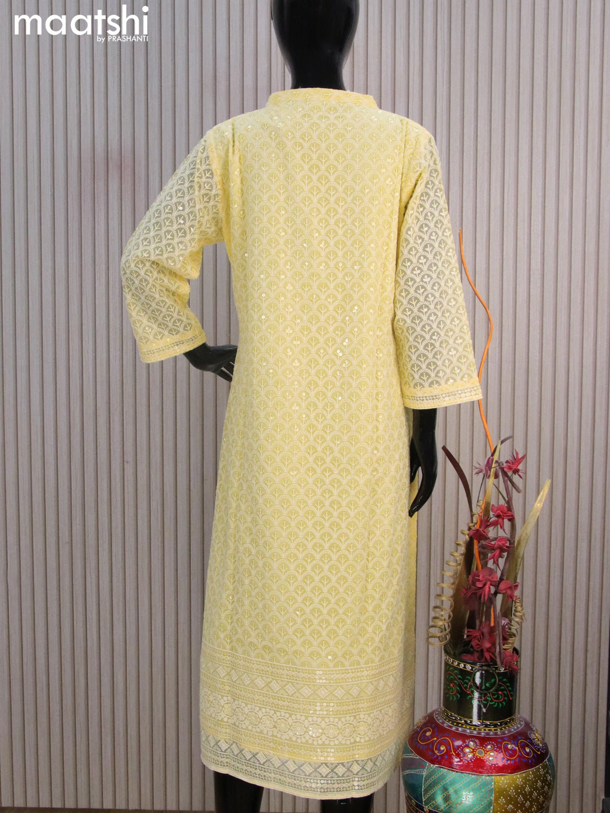 Semi georgette readymade kurti pale yellow with allover chikankari work & simple neck pattern without pant