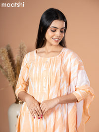 Cotton readymade salwar suit pale orange and off white with allover ikat weaves & simple neck pattern and straight cut pant & dupatta