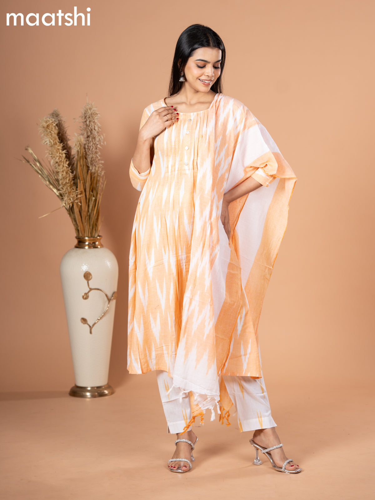 Cotton readymade salwar suit pale orange and off white with allover ikat weaves & simple neck pattern and straight cut pant & dupatta