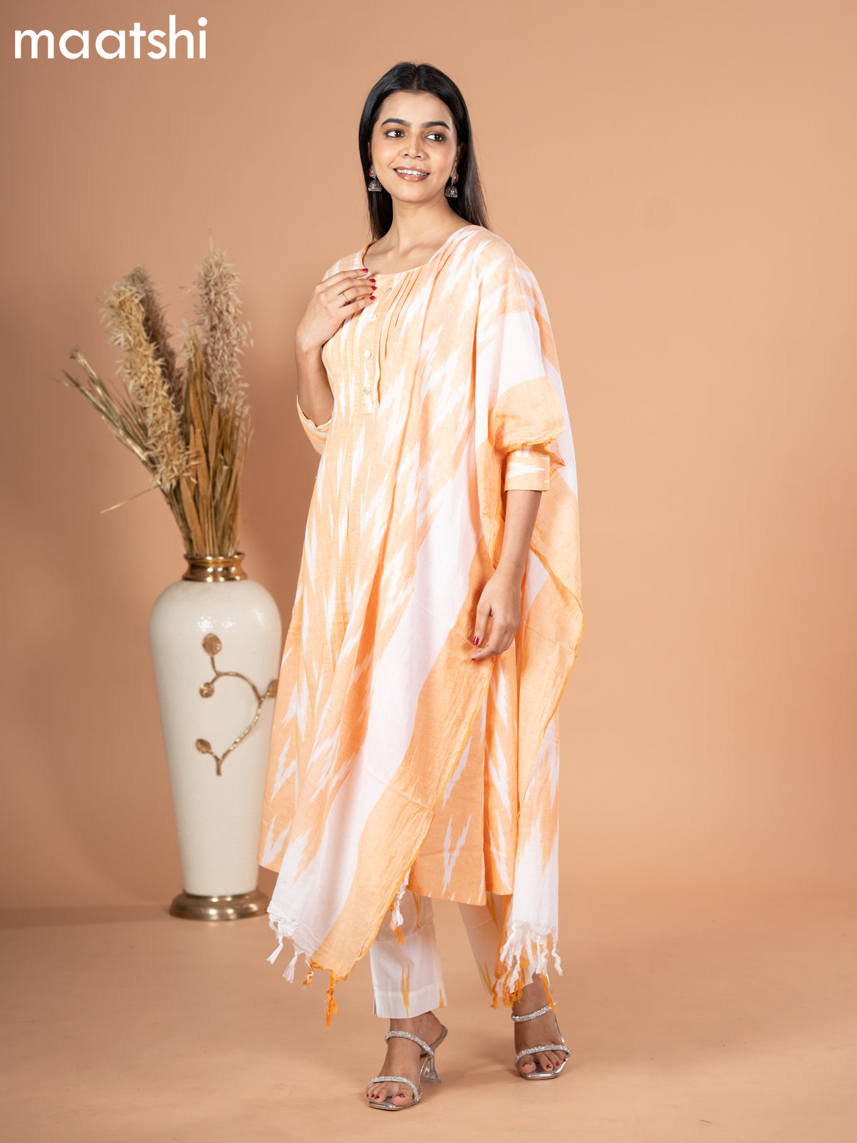 Cotton readymade salwar suit pale orange and off white with allover ikat weaves & simple neck pattern and straight cut pant & dupatta