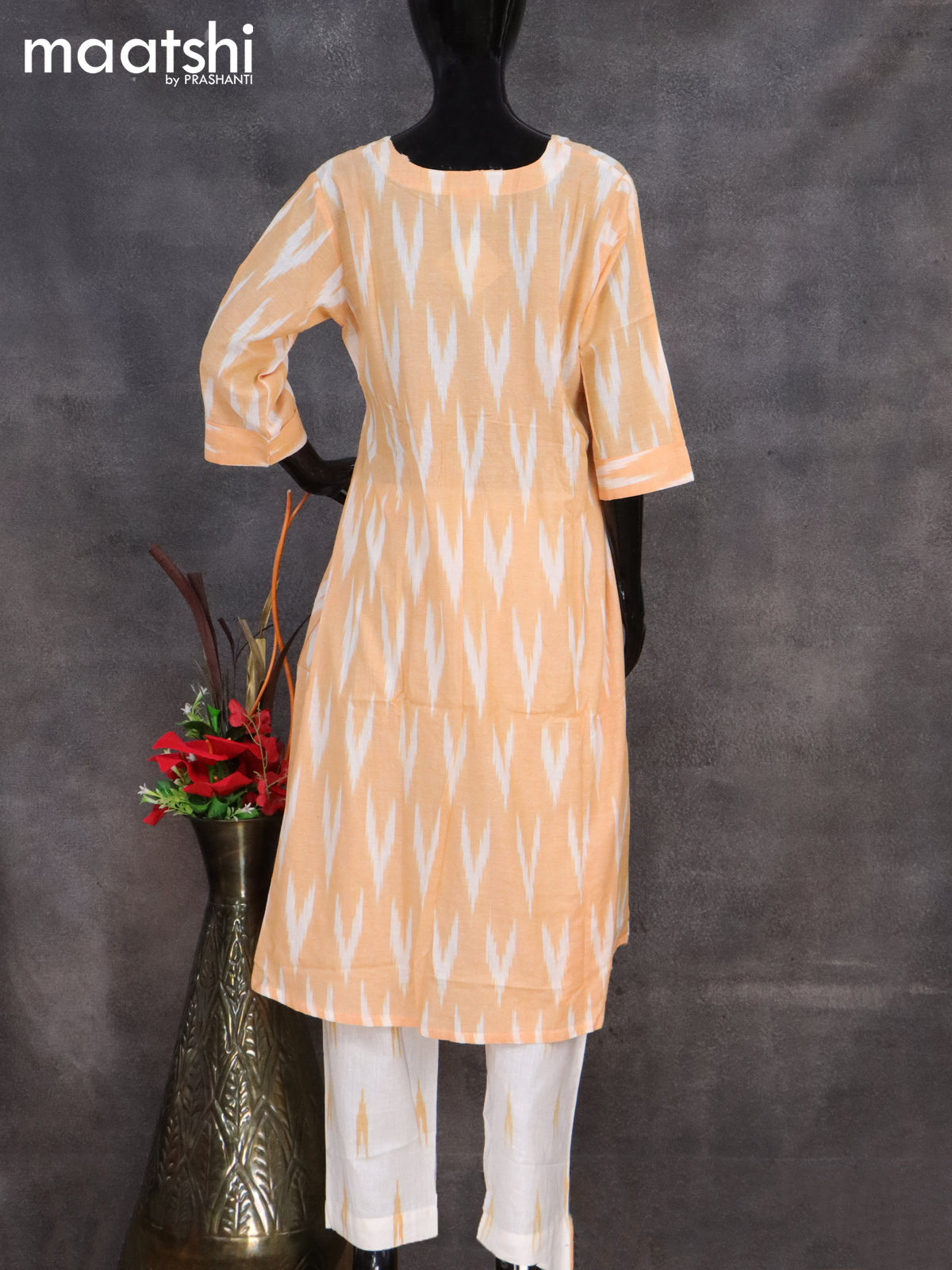 Cotton readymade salwar suit pale orange and off white with allover ikat weaves & simple neck pattern and straight cut pant & dupatta