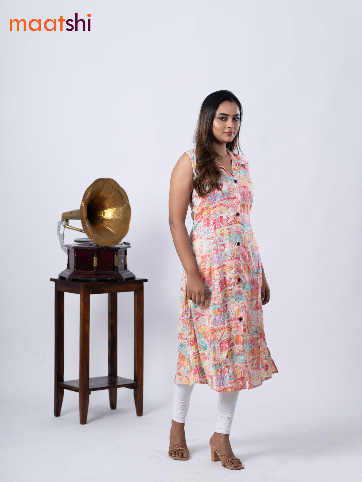 Rayon A-line kurti cream and teal blue with allover prints & thread weaves collar neck without pant & sleeve attached