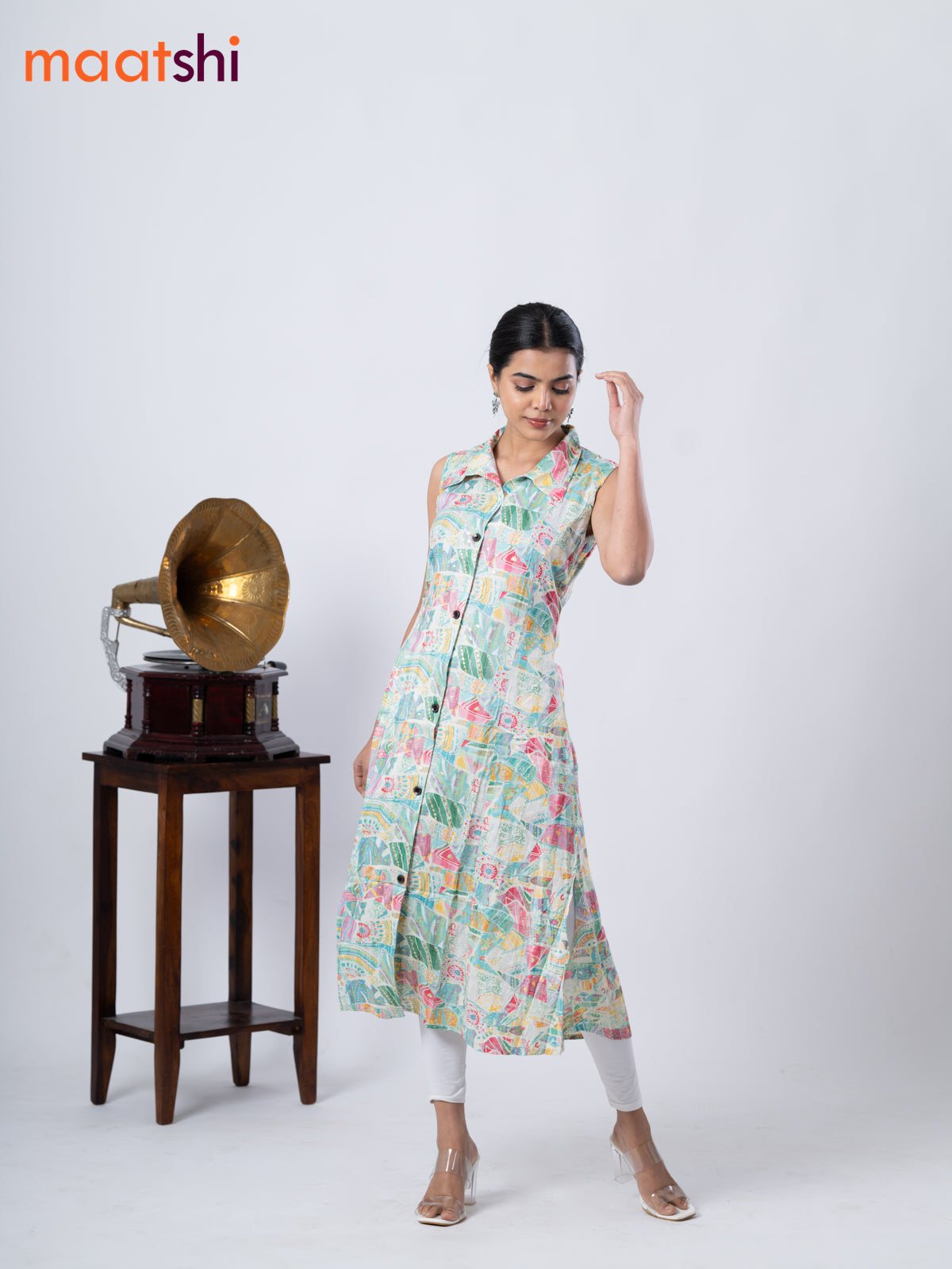 Rayon A-line kurti cream and pink shade with allover prints & thread weaves collar neck without pant & sleeve attached