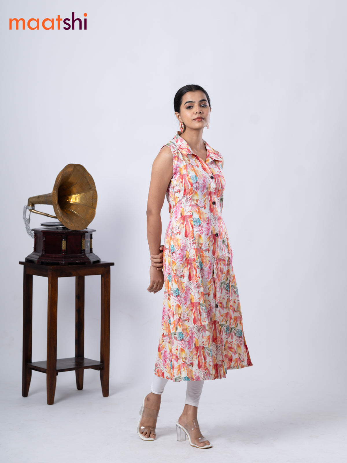 Rayon A-line kurti cream and pink with allover prints & thread weaves collar neck without pant & sleeve attached