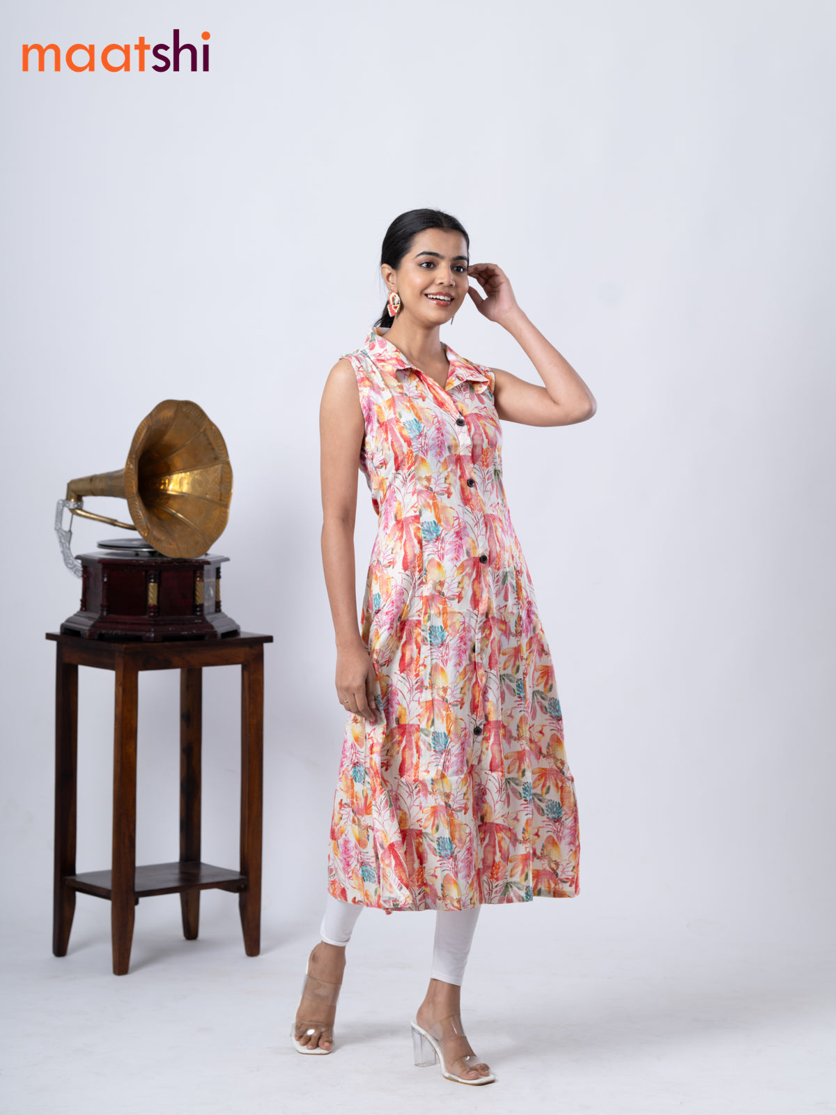 Rayon A-line kurti cream and pink with allover prints & thread weaves collar neck without pant & sleeve attached