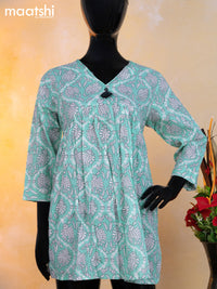 Cotton readymade short umbrella kurti teal blue and off white with allover prints & alia cut neck pattern without pant