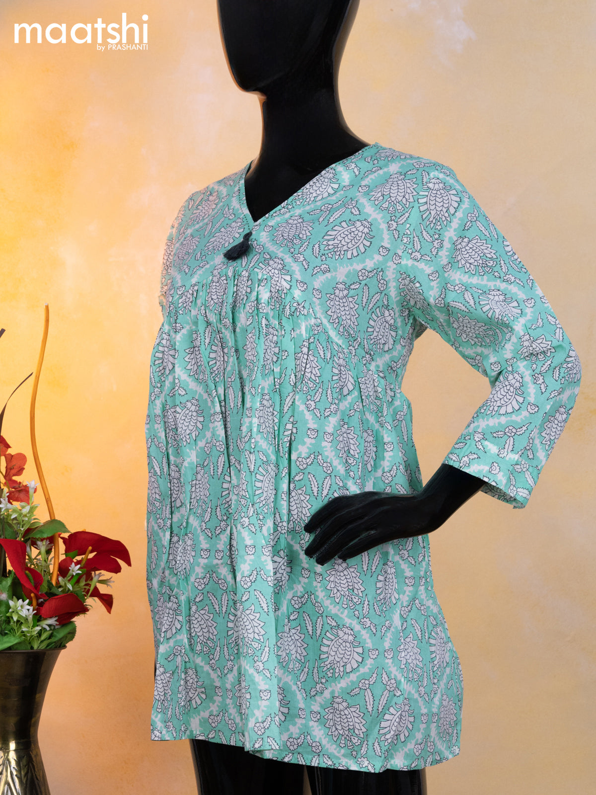 Cotton readymade short umbrella kurti teal blue and off white with allover prints & alia cut neck pattern without pant