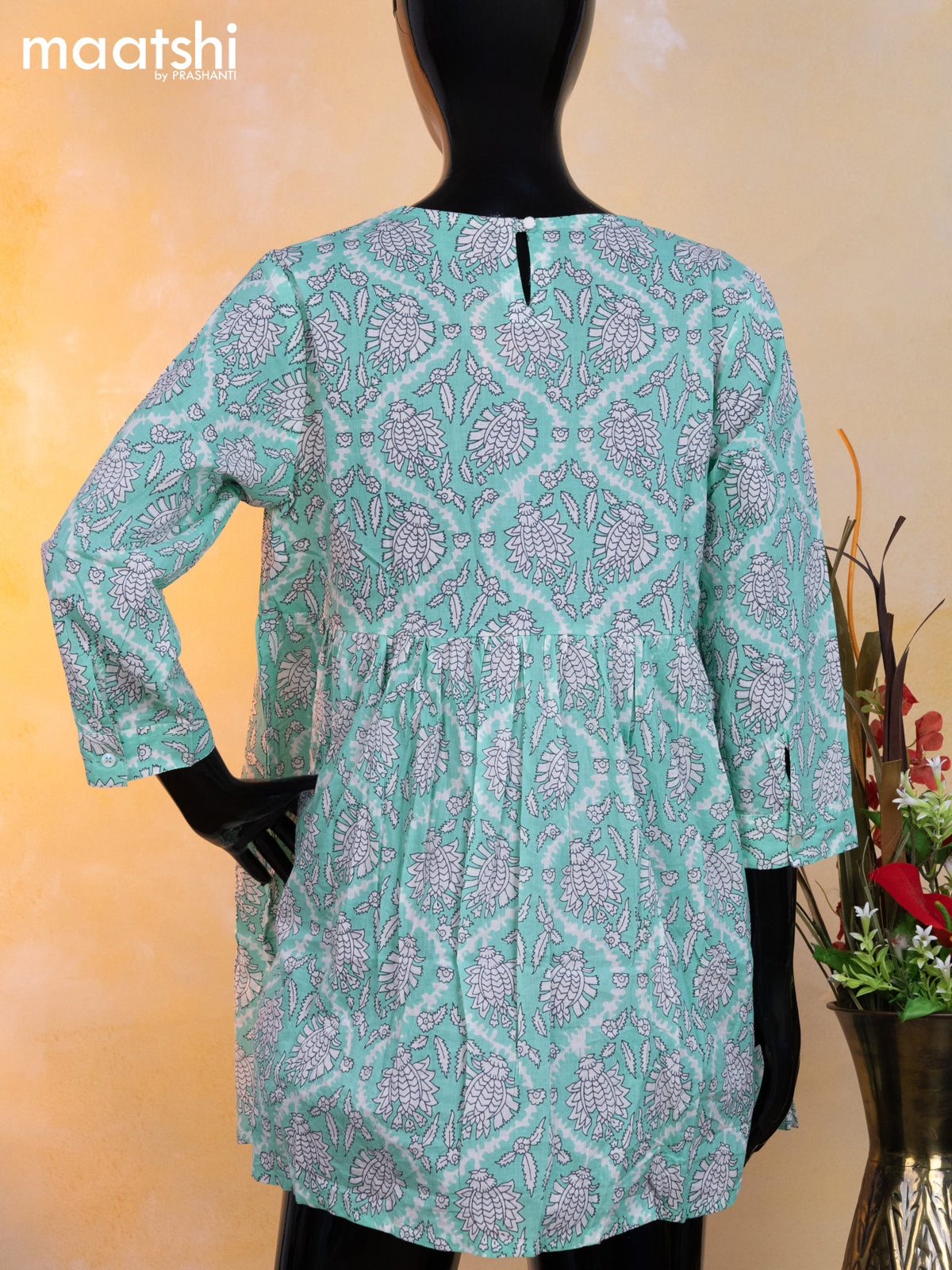 Cotton readymade short umbrella kurti teal blue and off white with allover prints & alia cut neck pattern without pant