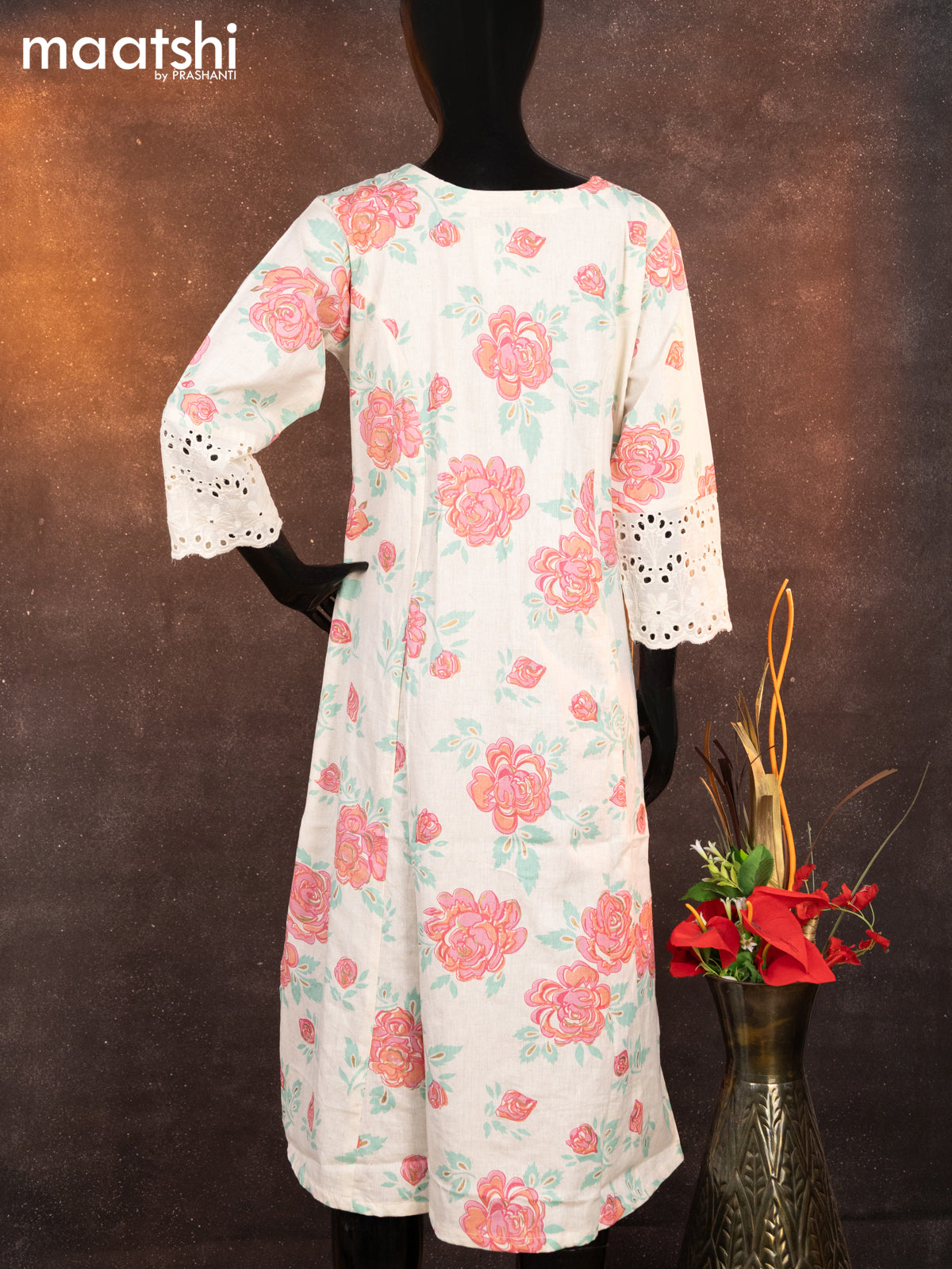 Cotton readymade A-line kurti off white and pink with allover floral prints & simple neck pattern without pant