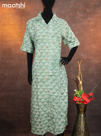 Cotton readymade A-line kurti pastel green with allover batik prints & simple neck pattern without pant