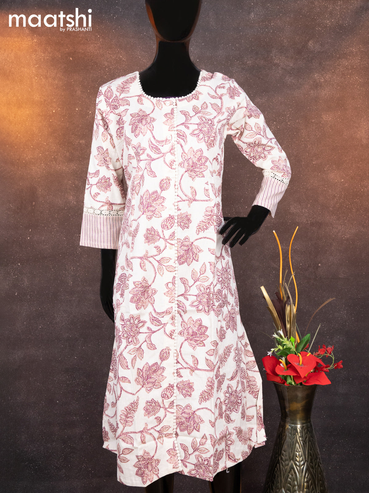 Cotton readymade A-line kurti off white and peach pink with allover floral prints & crocia lace work neck pattern without pant