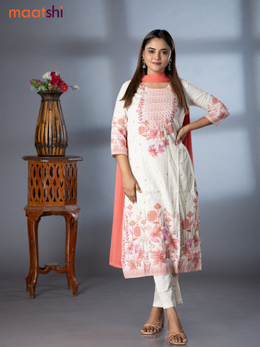 Placement prints readymade salwar suit off white and peach shade with floral prints & sequin beaded work neck pattern and straight cut pant & chiffon dupatta