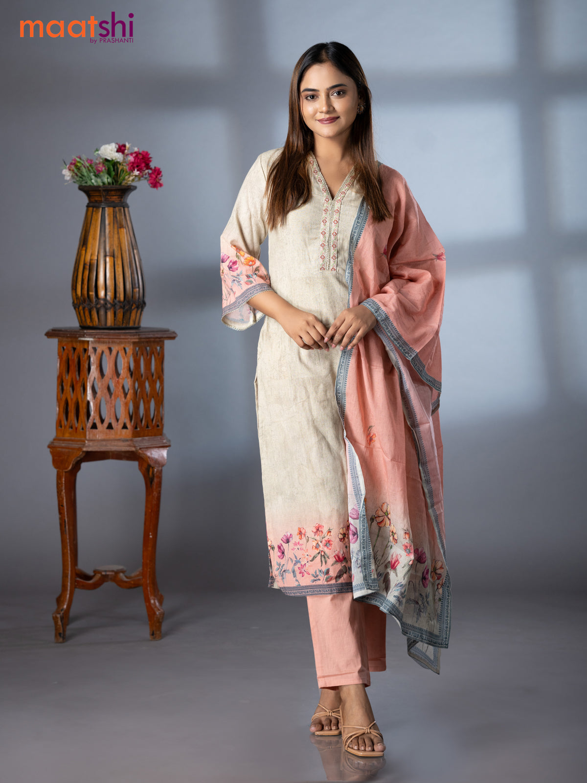 Placement prints readymade salwar suit elaichi green and peach pink with floral prints & embroidery work neck pattern and straight cut pant & dupatta