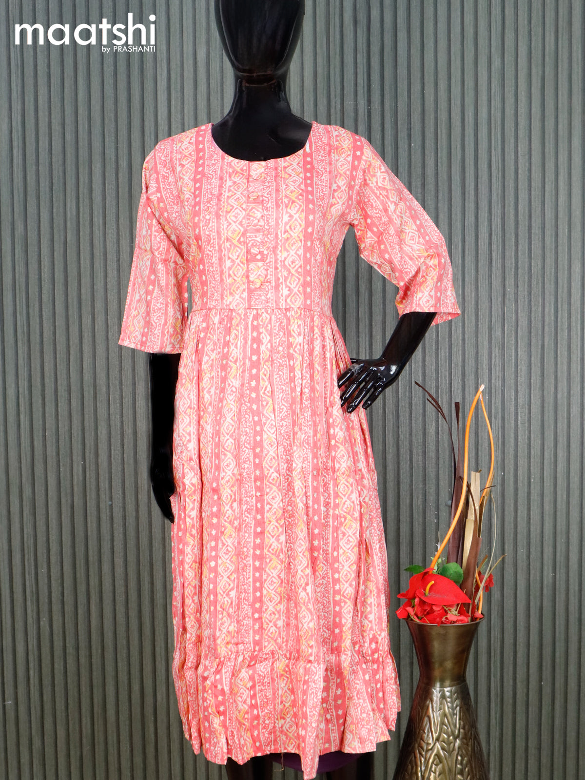 Rayon readymade umbrella kurti pink and cream with allover prints & simple neck pattern without pant