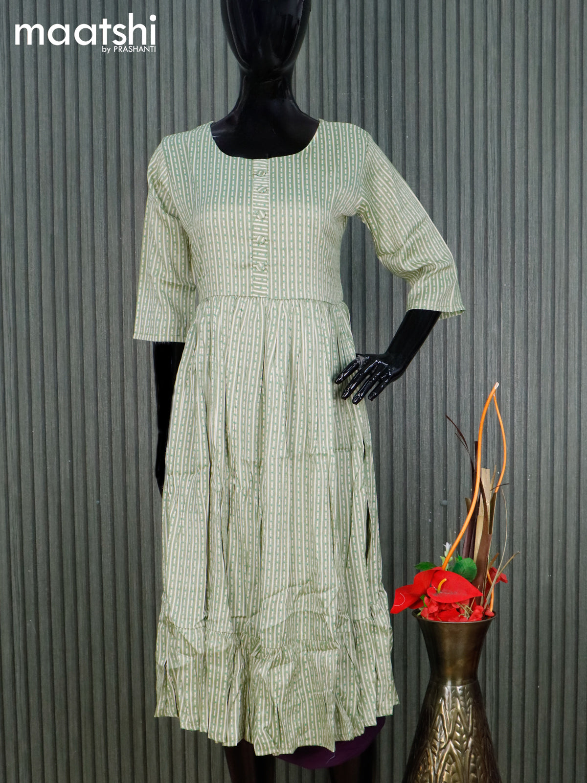 Rayon readymade umbrella kurti light green and cream with allover strips prints & simple neck pattern without pant