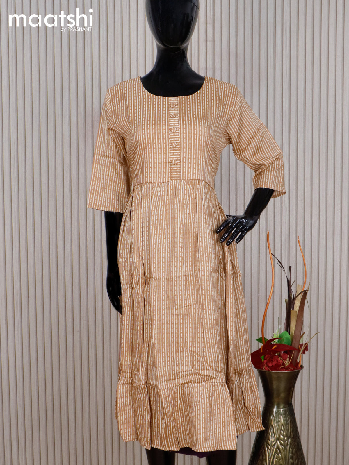 Rayon readymade umbrella kurti mustard yellow and cream with allover strips prints & simple neck pattern without pant