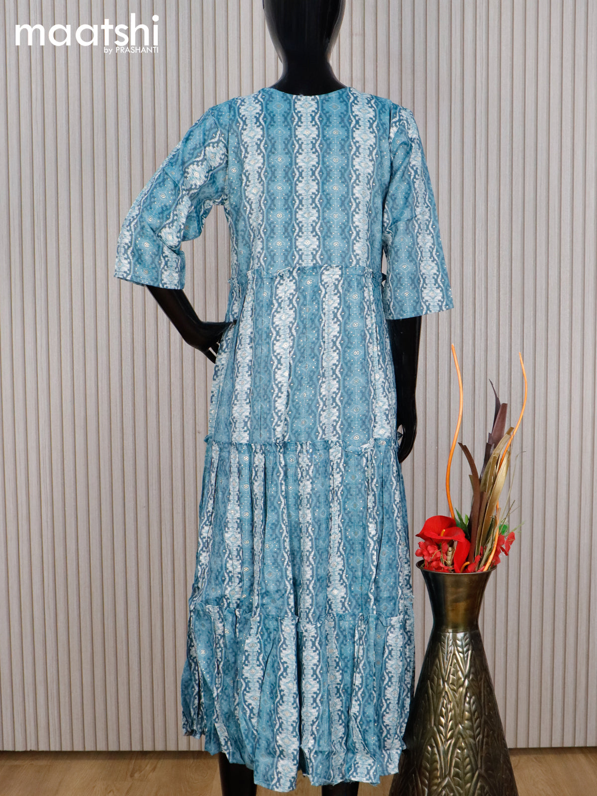 Rayon readymade umbrella kurti pastel blue and off white with allover prints & simple neck pattern without pant