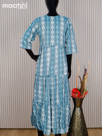 Rayon readymade umbrella kurti pastel blue and off white with allover prints & simple neck pattern without pant