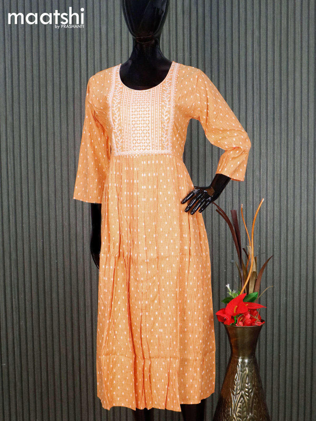 Cotton readymade umbrella kurti pale orange and off white with allover butta prints & embroidery sequin work neck pattern without pant