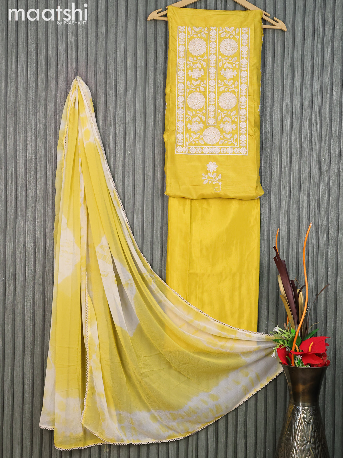 Raw silk dress material yellow with floral buttas & embroidery work neck pattern and bottom & chiffon dupatta